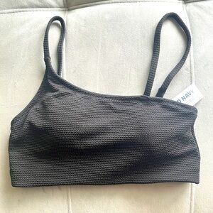 Asymmetrical black swim top